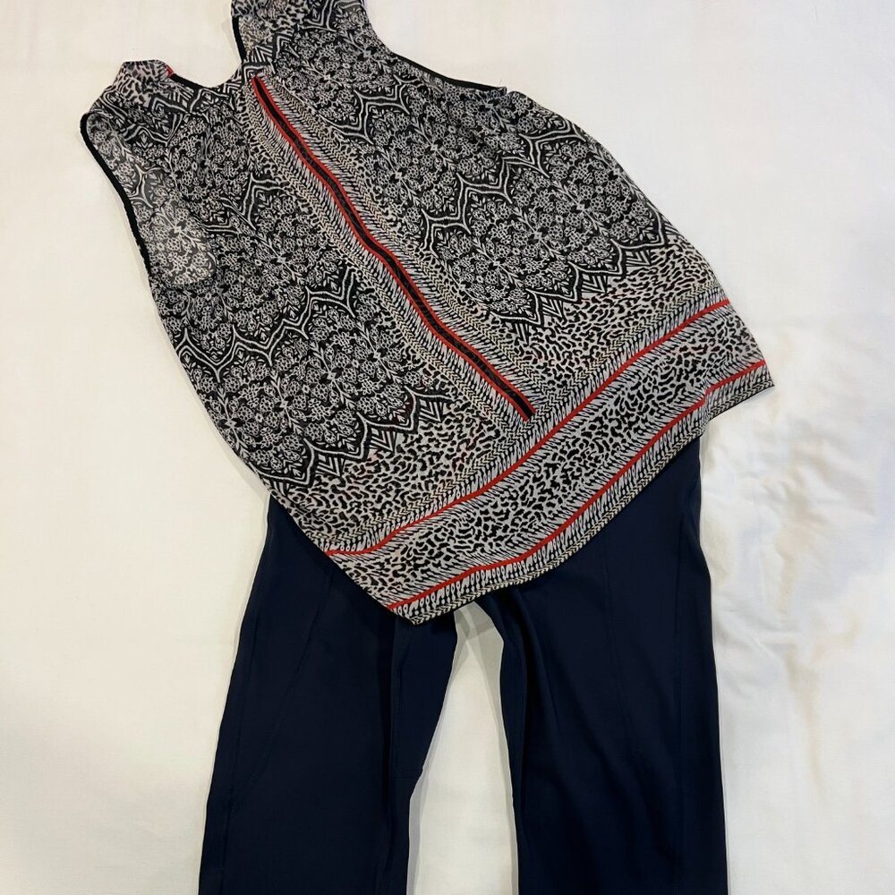 Sleeveless Black & White Printed Blouse with Red Trim